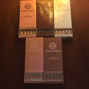 Five unopened packs of Static Nails